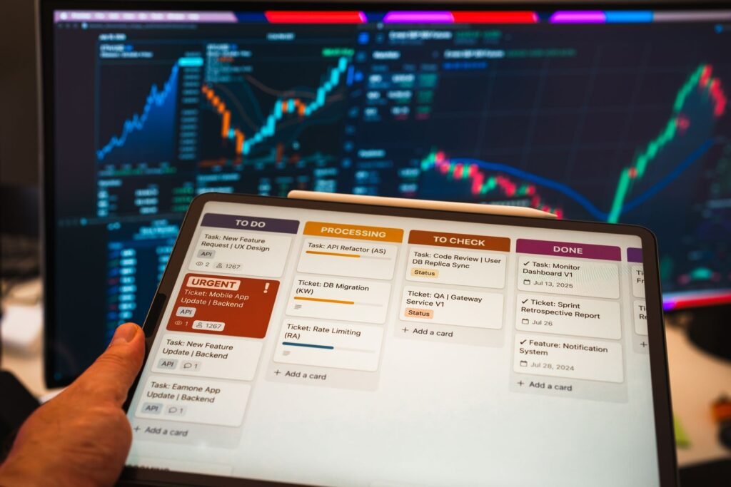 Person using workflow automation dashboard on tablet